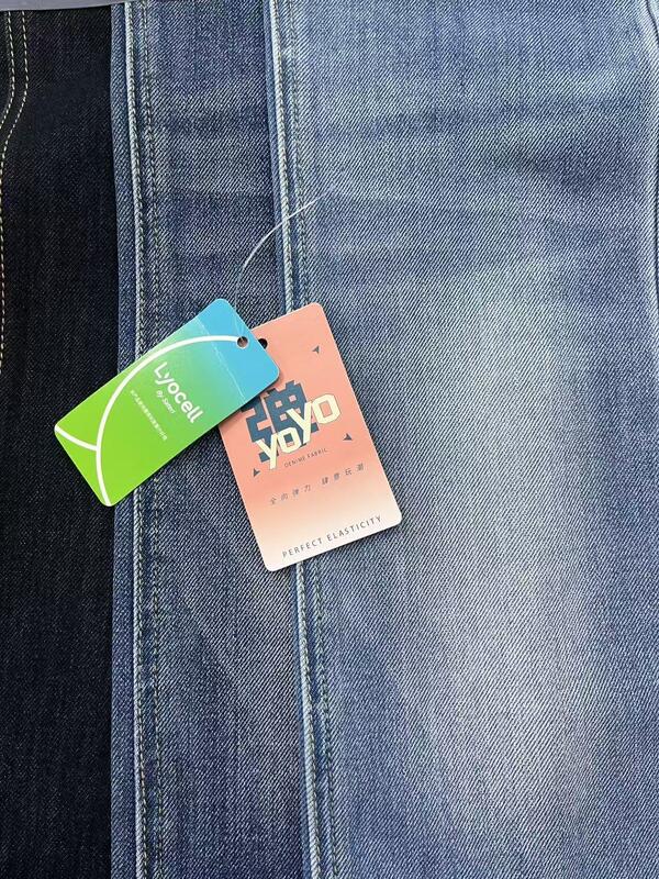 Dark Blue+Green 4-Way Stretch Vertical Slub Denim Fabric with 8S Warp Slub and 25% Lyocell Blend